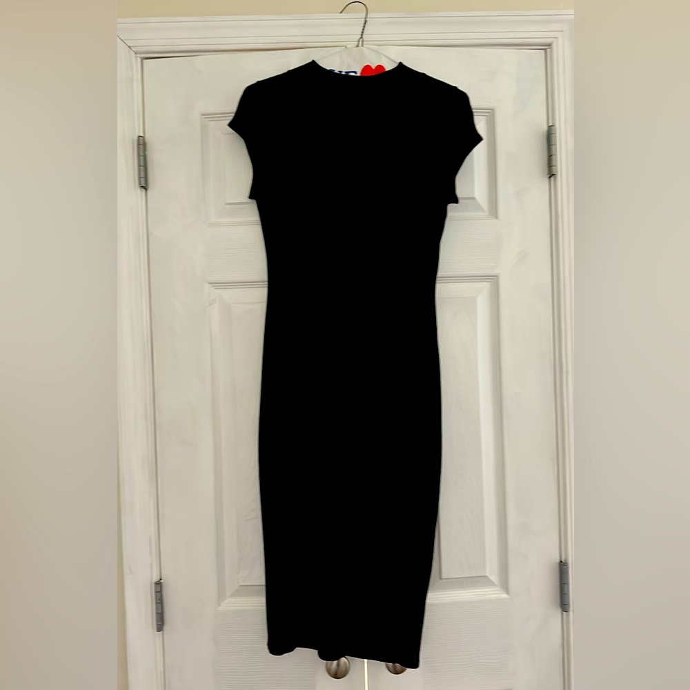 Stella Luce bodycon midi dress. Never worn but no tags